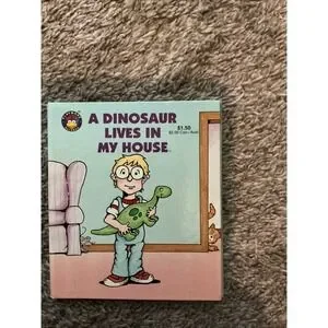 A Dinosaur Lives in My House by Nora Smith