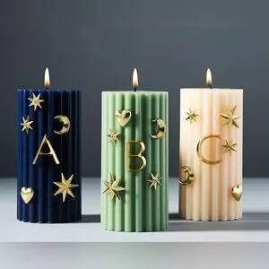 Anthropologie Gold Star And Moon Candle Charms