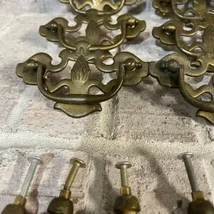 Antique Drawer Pulls With A Ornate Design