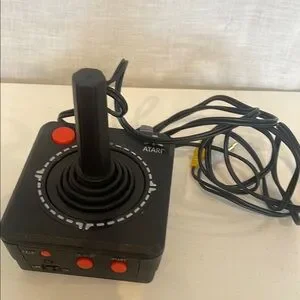 Black Atari plug in multi game piece