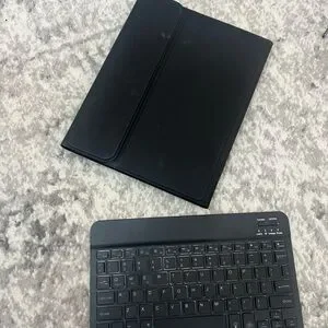 Black IPad Case With Keyboard And Apple Pencil