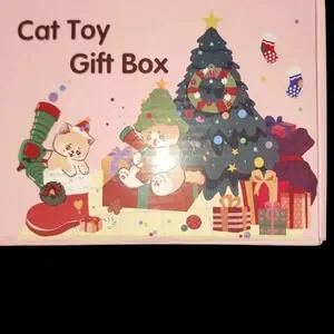 Cat Christmas Toy. LOTS OF LITTLE BALLS AND A GUN TO shoot the ball for fetching