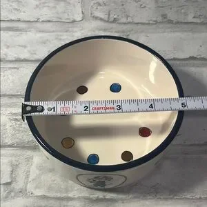 Cream Ceramic Small Dog Bowl With Cartoon Dogs Design Juggler Jester