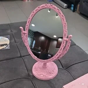 Elegant Pink Oval Vanity Mirror