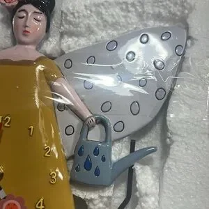 Enesco Allen Designs Guardian Woman With/Flowers Pendulum Wall Clock 12.2”