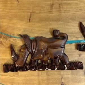 Hand Carved Rhino Wall Art – Boho Wood Decor Swords