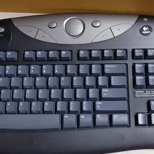 Logitech Cordless Freedom Optical - Cordless Keyboard And Optical Mouse
