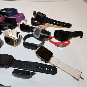 Lot Of Fitness Trackers Smart Watches Various Brands For Parts Or Repair