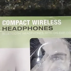 NIB Brookstone Black Compact Wireless Headphones
