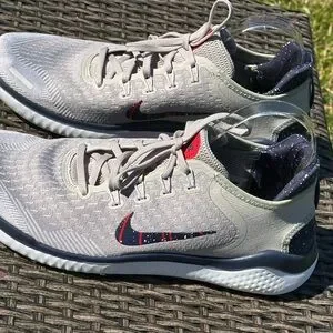 Nike Gray And Red Athletic Shoes With Breathable Mesh