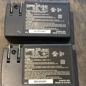 Pair Of Cannon CB-2LT Camera Battery chargers