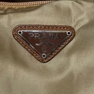 Prada Gold Toiletry Bag Nylon COA
