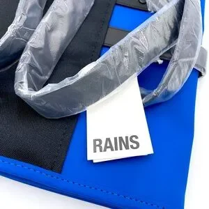 Rains Blue Backpack With Minimalist Design