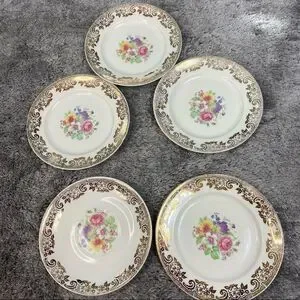 Stetson five 22k gold floral saucer plates