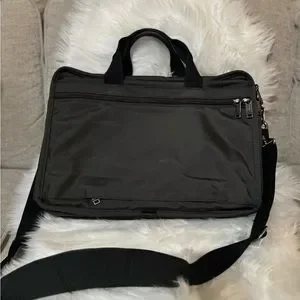 Tumi Black Laptop Bag With Detachable Strap And Professional Design