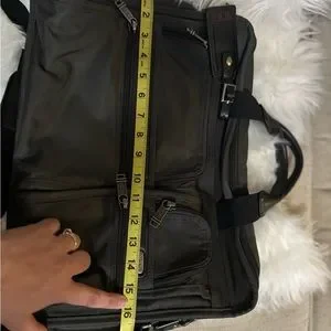 Tumi Black Laptop Bag With Detachable Strap And Professional Design