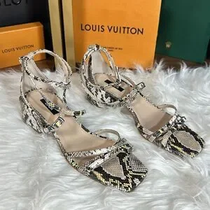 Unworn snake print wedges