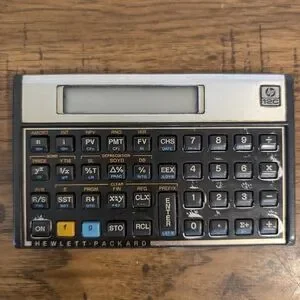 Used RARE Vintage HP-12C Financial CALCULATOR W/ ORIGINAL CASE & MANUAL USA Made
